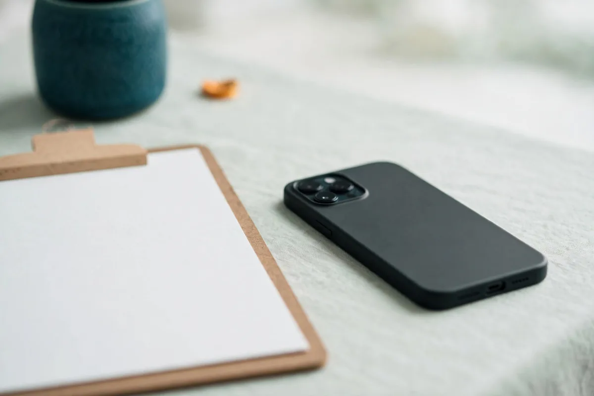 A phone and a clipboard